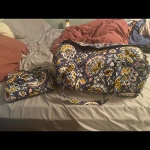 Vera Bradley duffel and bathroom bag set.